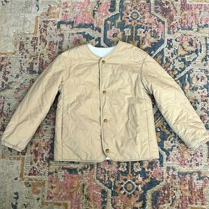 Unisex reversible quilted and deep pile fleece.